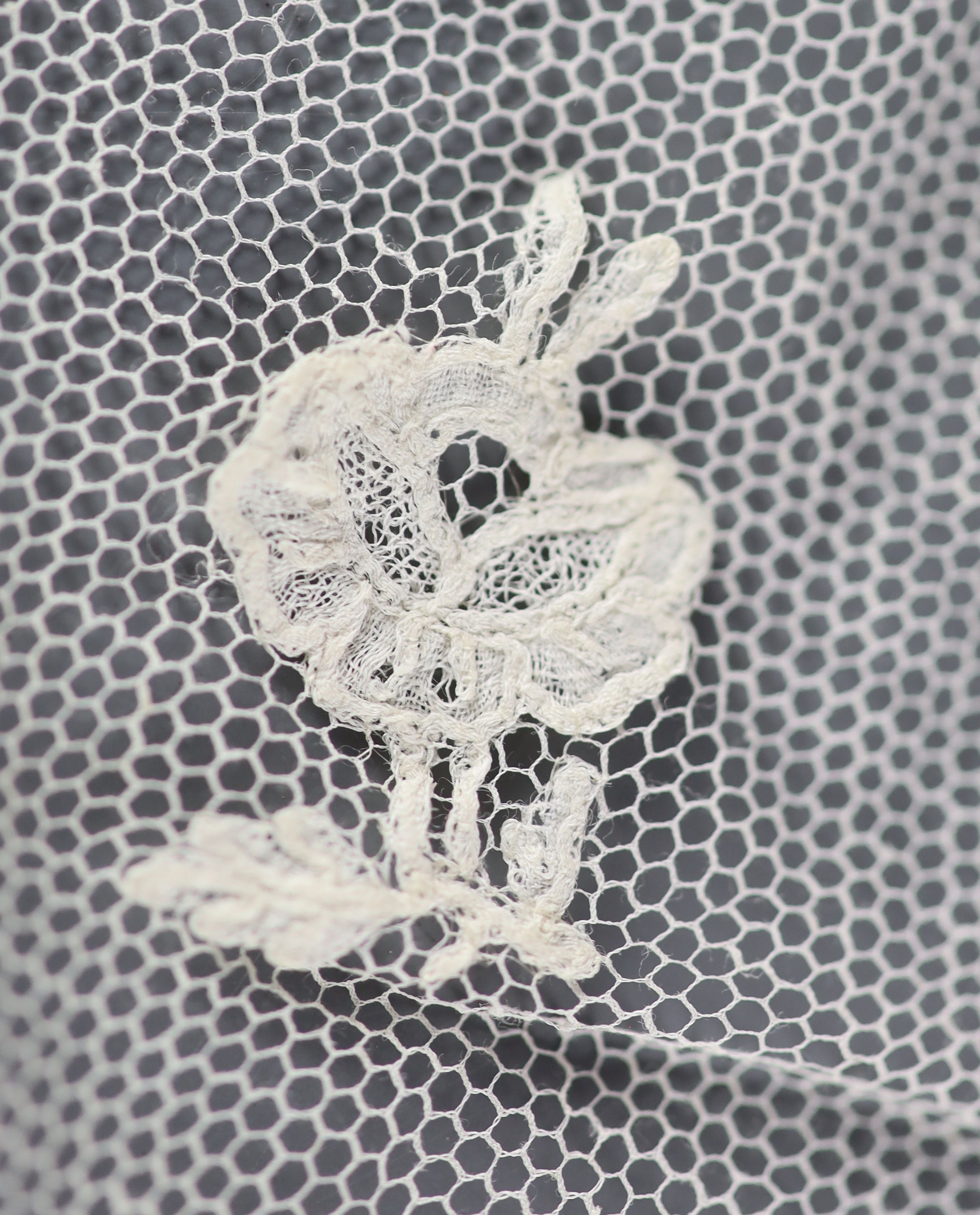 A fine 19th century bobbin lace Brussels christening veil, with letter of provenance and Ladies Society letter,